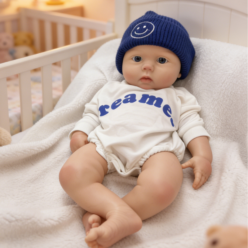 22Inch Cool & Calm Reborn Baby Doll Silas – Navy Smiley Knit Beanie & Minimalist White Onesie, Perfect Cuddle Partner