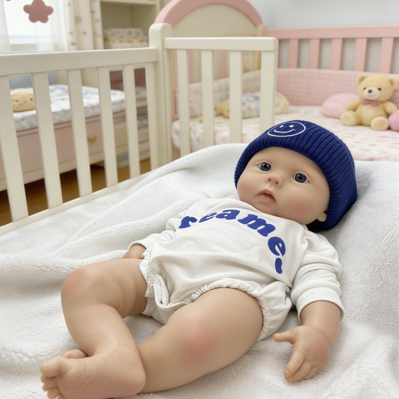 22Inch Cool & Calm Reborn Baby Doll Silas – Navy Smiley Knit Beanie & Minimalist White Onesie, Perfect Cuddle Partner