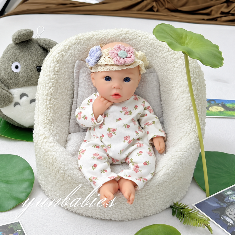 Ivy drinking and wetting silicone reborn baby doll photo